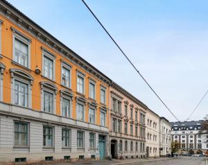 a row of buildings on a city street at Forenom Serviced Apartments Oslo Nobel in Oslo