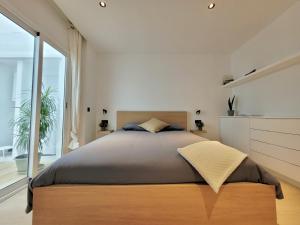 Posteľ alebo postele v izbe v ubytovaní Meraki Home