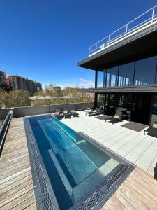 a swimming pool on the roof of a building at Piranesi 246 in Milan
