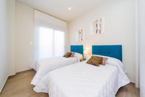 Posteľ alebo postele v izbe v ubytovaní Apartamento Alegria ID8