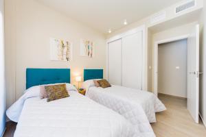 Posteľ alebo postele v izbe v ubytovaní Apartamento Alegria ID8