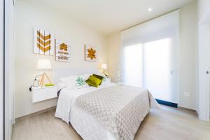 Posteľ alebo postele v izbe v ubytovaní Apartamento Alegria ID8