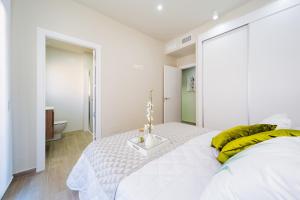 Posteľ alebo postele v izbe v ubytovaní Apartamento Alegria ID8