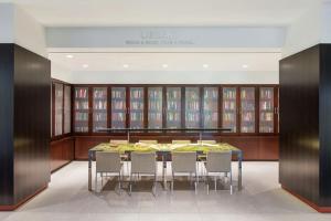 a dining room with a table and chairs at Luxury, Style, and Convenience condo at Crystal City in Arlington