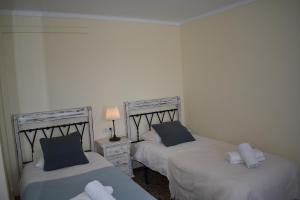 A bed or beds in a room at Casa Berrincha