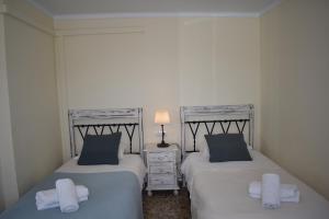 A bed or beds in a room at Casa Berrincha