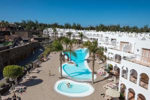 an overhead view of a pool at a resort at Sotavento Beach Club in Costa Calma