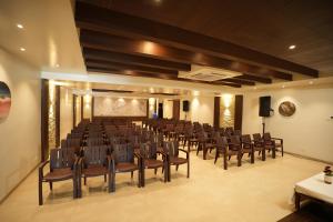 a large room with a bunch of chairs in it at Sri Ambal Grand in Virudunagar