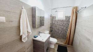 Koupelna v ubytování STAMATIS CORFU APARTMENTS + 37 fotografií