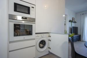 Kuchyňa alebo kuchynka v ubytovaní Apartamento Alegria ID112