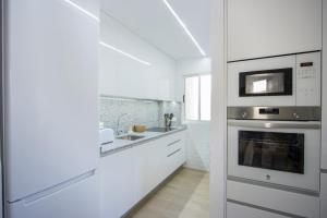 Kuchyňa alebo kuchynka v ubytovaní Apartamento Alegria ID112