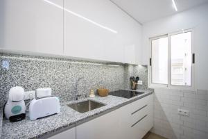 Kuchyňa alebo kuchynka v ubytovaní Apartamento Alegria ID112