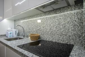Kuchyňa alebo kuchynka v ubytovaní Apartamento Alegria ID112