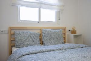 Posteľ alebo postele v izbe v ubytovaní Apartamento Alegria ID112