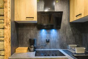 Η κουζίνα ή μικρή κουζίνα στο Appartement Le Cuchon St-Léger-les-Mélèzes