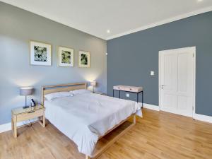 Postel nebo postele na pokoji v ubytování Cottage 8 - Virginia Avenue Villas