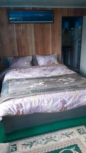 Postel nebo postele na pokoji v ubytování Parichay Homestay