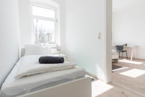 Fotografie z fotogalerie ubytování Komfortable Monteursunterkunft: 4-Zimmer-Wohnung mit getrennten Betten v destinaci Erfurt
