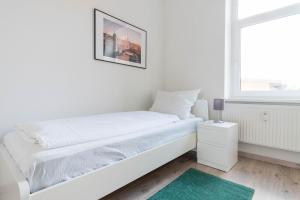 Postel nebo postele na pokoji v ubytování Komfortable Monteursunterkunft: 4-Zimmer-Wohnung mit getrennten Betten