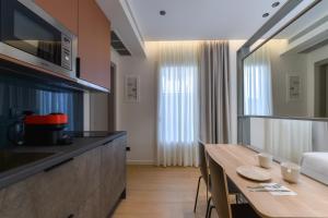 A television and/or entertainment centre at Zalo Urban Living Spaces