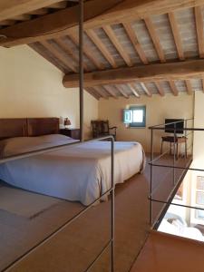 Llit o llits en una habitació de Borgo Cardaneto