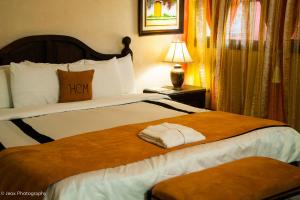 Cama o camas de una habitación en Hotel Camino Maya