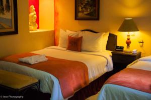 Cama o camas de una habitación en Hotel Camino Maya