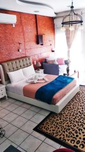 Postel nebo postele na pokoji v ubytování Sweet Home Suite