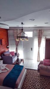 Postel nebo postele na pokoji v ubytování Sweet Home Suite