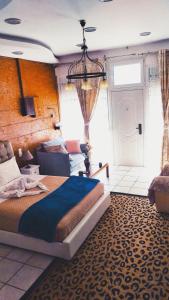Postel nebo postele na pokoji v ubytování Sweet Home Suite