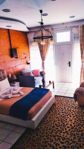 Postel nebo postele na pokoji v ubytování Sweet Home Suite