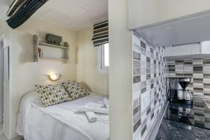 Postel nebo postele na pokoji v ubytování Terrasse to Sunset D-luxe