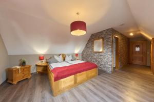 Postel nebo postele na pokoji v ubytování Landhotel Brauner Hirsch