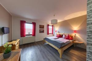 Postel nebo postele na pokoji v ubytování Landhotel Brauner Hirsch