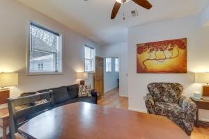 a living room with a table and a couch at Downtown Marlinton Vacation Rental Apartment! in Marlinton