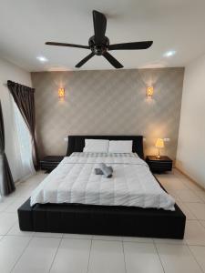 Katil atau katil-katil dalam bilik di Ipoh Premium Cozy Relax Home