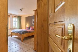 Postel nebo postele na pokoji v ubytování Landhotel Brauner Hirsch