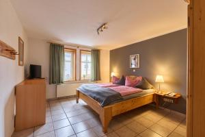 Postel nebo postele na pokoji v ubytování Landhotel Brauner Hirsch