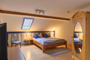 Postel nebo postele na pokoji v ubytování Landhotel Brauner Hirsch + 36 fotografií