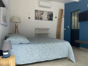Postel nebo postele na pokoji v ubytování Au Sabluline chambres d'hôtes gîtes