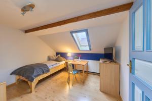 Postel nebo postele na pokoji v ubytování Landhotel Brauner Hirsch