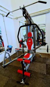 a gym with cardio equipment in a room at FBC Fortuny Resort - Adults Only in Maspalomas