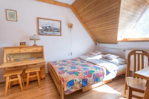 Katil atau katil-katil dalam bilik di Apartament Dolne Krupowki