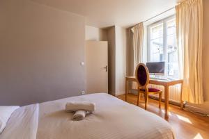 Posteľ alebo postele v izbe v ubytovaní CHARME ZEN Thermes 3 Étoiles + 25 fotografií