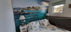 Posteľ alebo postele v izbe v ubytovaní U CASEDDU- Villa piscine privée chauffée- vue mer- clim-wifi