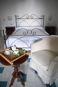 Postel nebo postele na pokoji v ubytování Villa Fiorita Lipari - Villa Fiori di Campo