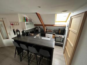 Kuchyňa alebo kuchynka v ubytovaní Appartement agréable à Malo proche de la plage + 6 fotografií
