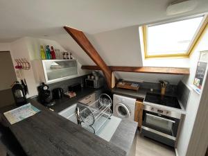 Kuchyňa alebo kuchynka v ubytovaní Appartement agréable à Malo proche de la plage