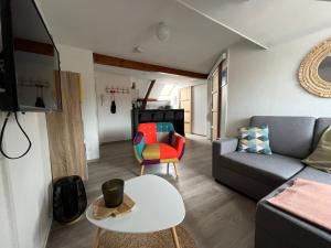 Posedenie v ubytovaní Appartement agréable à Malo proche de la plage