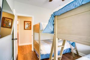 a bunk room with two bunk beds in it at Lake Charles Vacation Rental - 3 Mi to Casinos! in Lake Charles